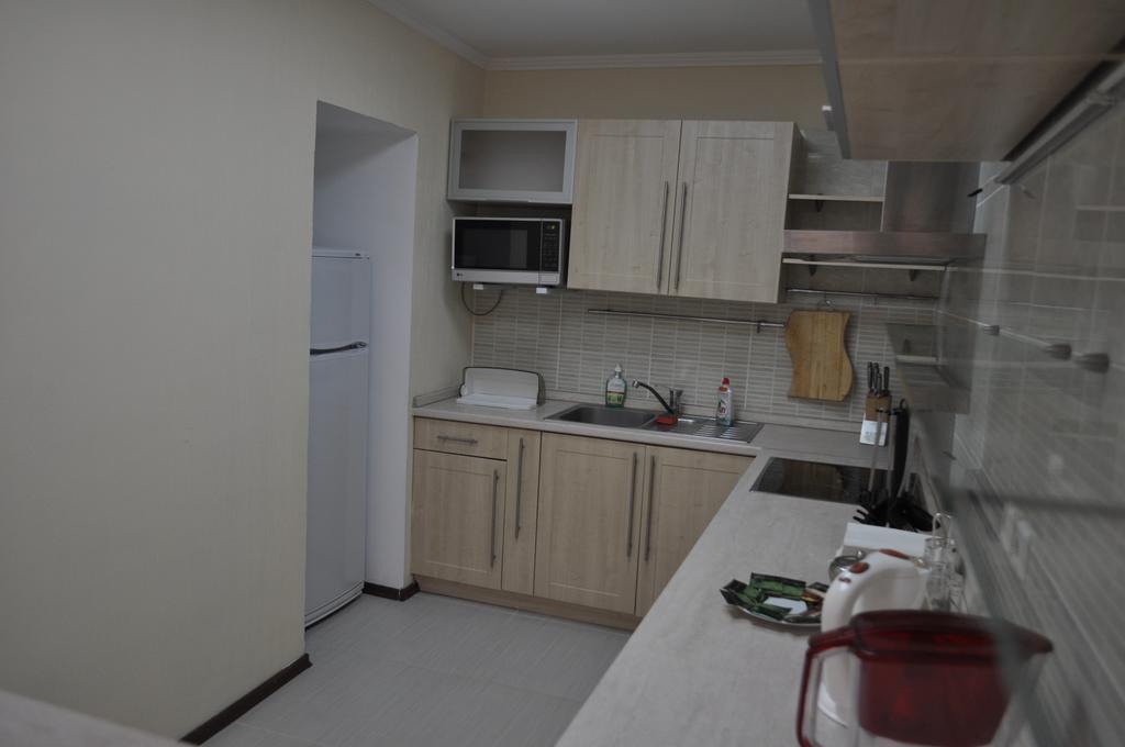 Sunrise Apartments Triumph Asztana Szoba fotó