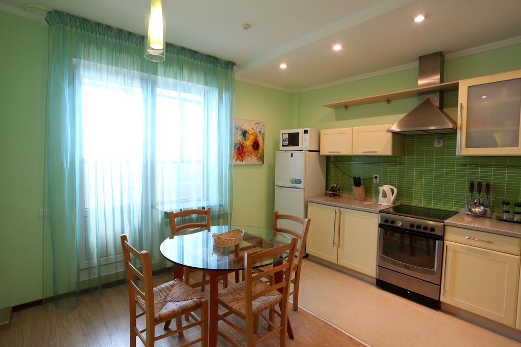 Sunrise Apartments Triumph Asztana Szoba fotó